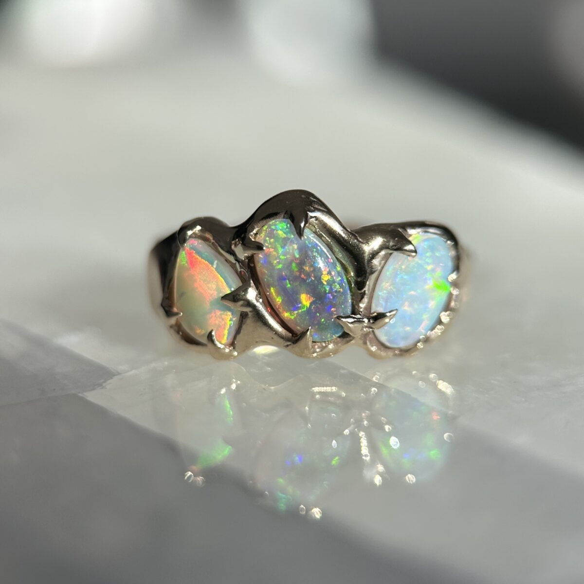 Molten gold ring with Australian Crystal and Dark Opals SZ 6.75